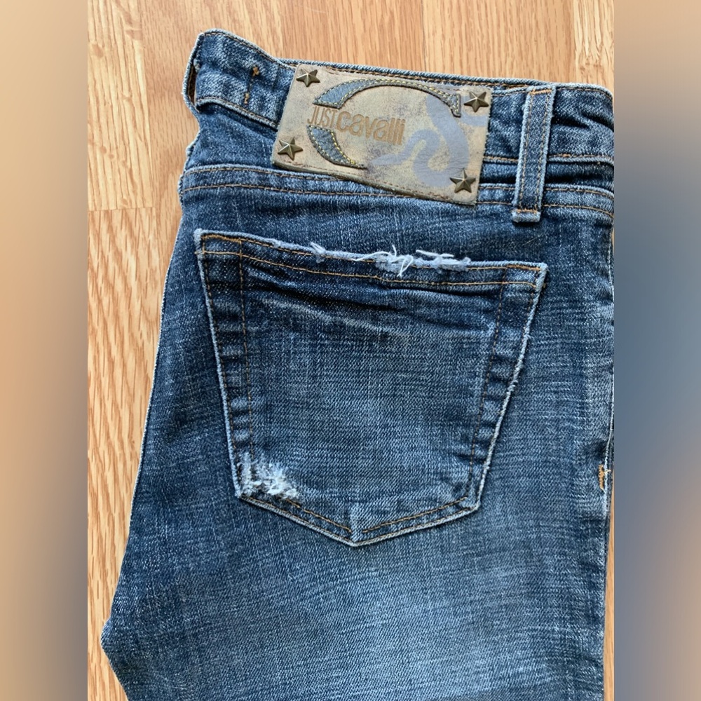 Woman’s Designer “Just Cavalli” Distressed Boot Cut Jeans